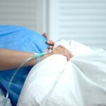 Pregnant woman in hospital, Action plan to improve maternal health in America | OBHG