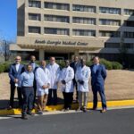 Clinicians in front of hospital | OBHG